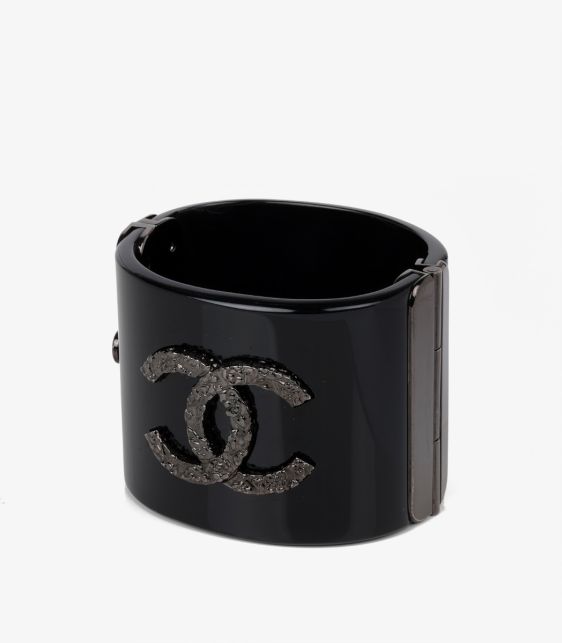A Pre-Loved Chanel Silver Tone Black Resin & Textured Metal Wide CC Cuff Bracelet from Xupes