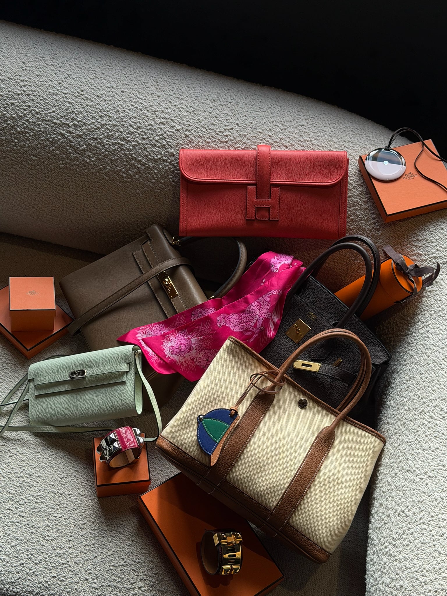 A selection of Hermès bags and accessories