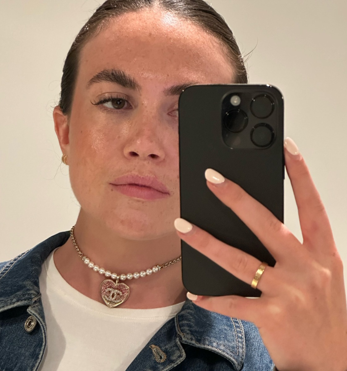 Xupes Assistant Buyer, Eden Molen wearing a mixture of pre-loved Chanel Jewellery from Xupes.