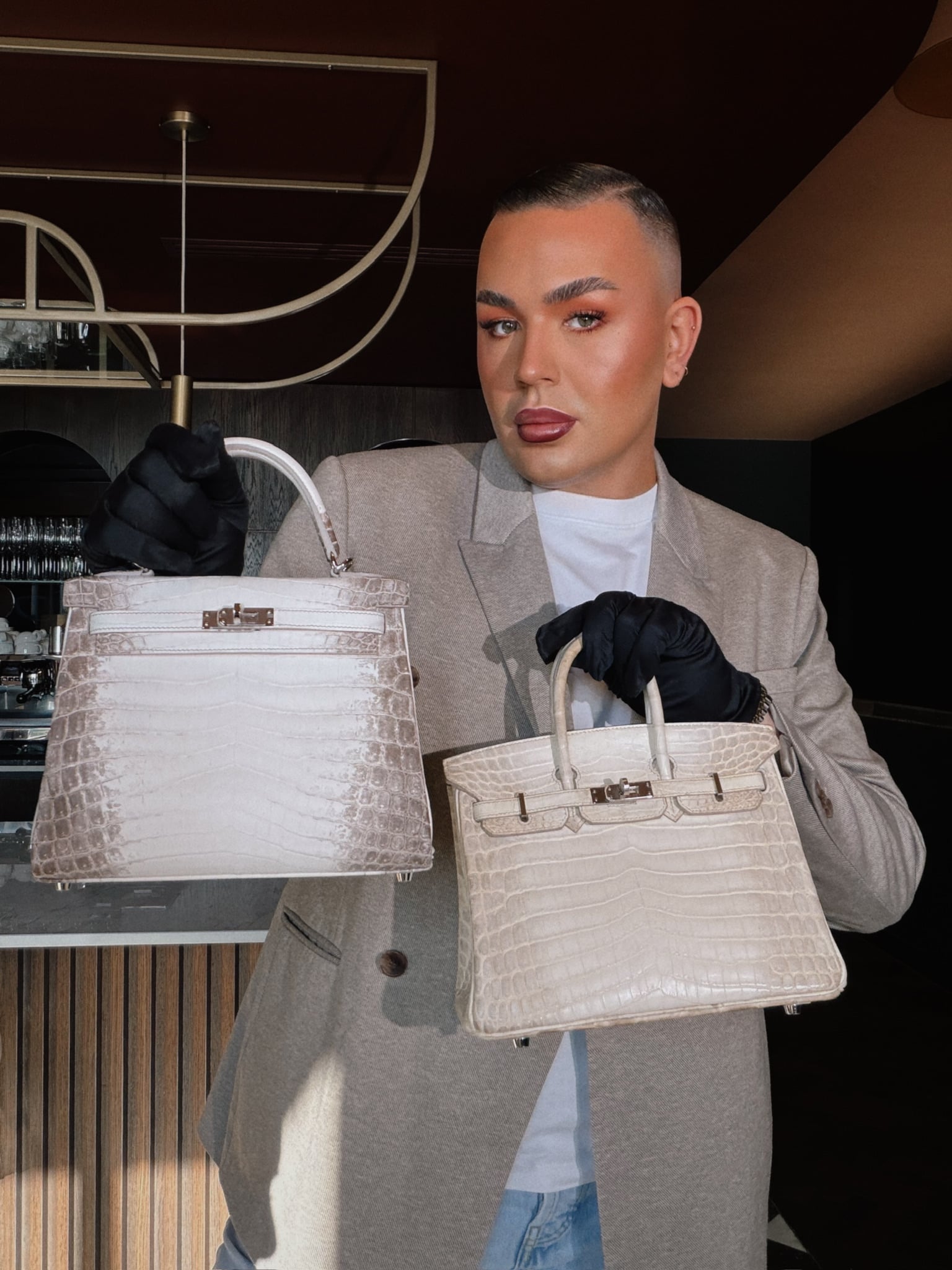 Reece with two Hermès bags at Xupes