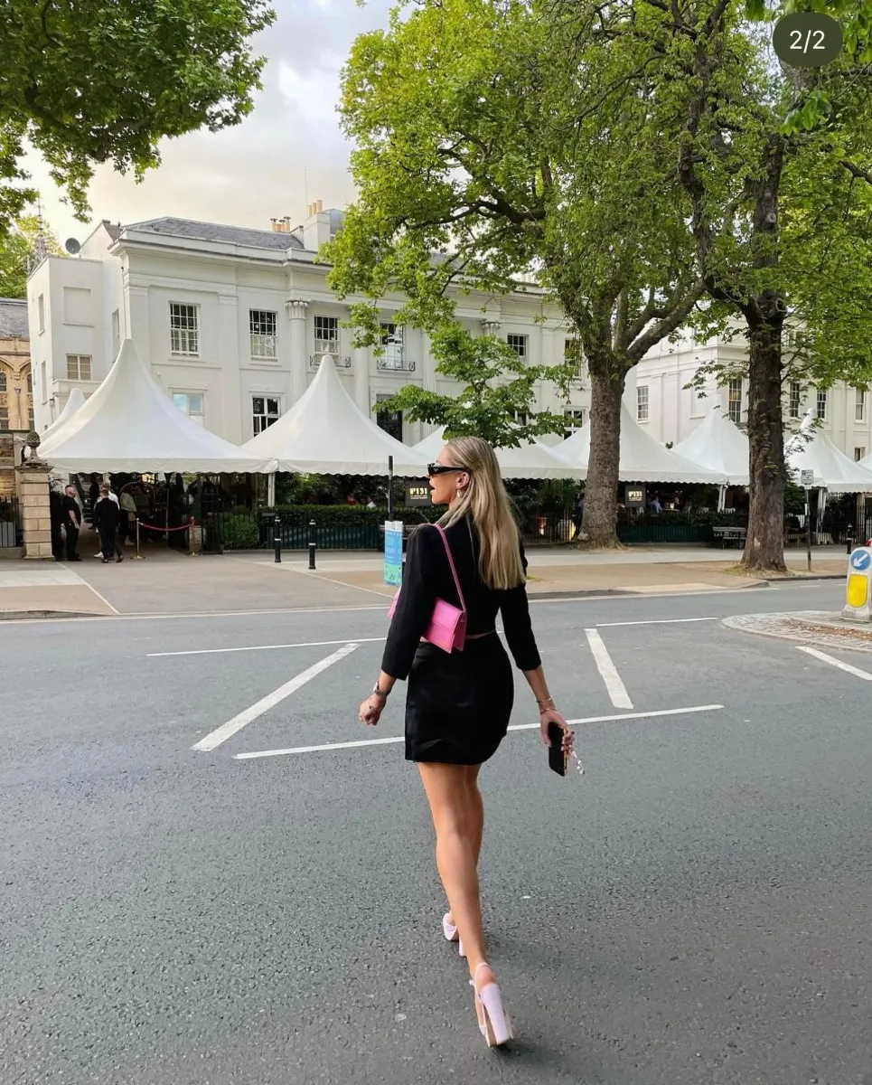 Rebecca Dransfield of Sandersons Department Stores with a pink Jacquemus bag from Xupes 