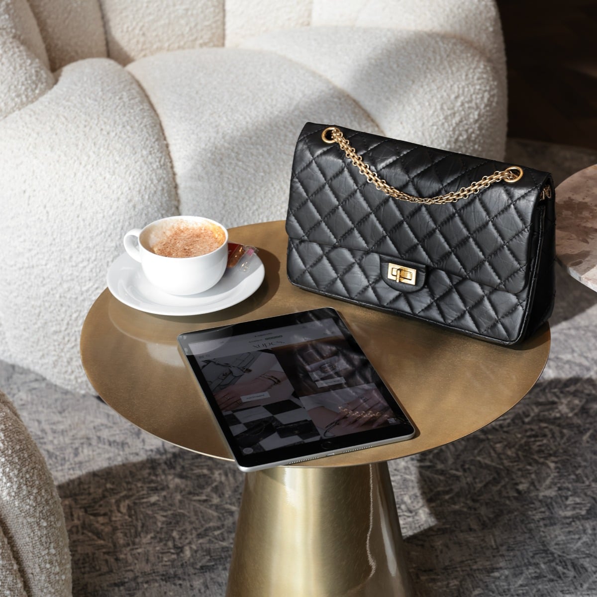 A personal viewing with a Chanel bag and coffee at Xupes