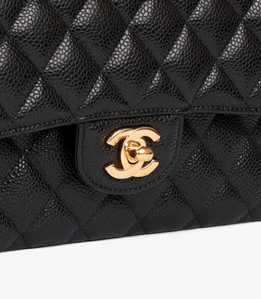 Turn lock of Chanel Black Quilted Caviar Leather Small Classic Double Flap Bag